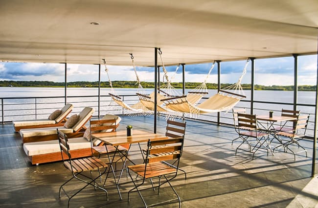 Open air deck with hammocks and sitting area