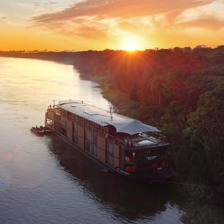 Aqua Nera moored by the banks of the Amazon